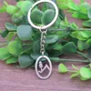 Keychains Simple Fashion Oval Snow Mountain Pine Tree Keychain Nature Jewelry Christmas Gift