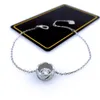 Xiangjia Bracelet en diamant rond ananas avec réseau européen et américain - Bracelet incolore en acier titane - Motif diamant - Bijoux à main