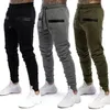 Nuevos hombres Gimnasio Slim Fit Pantalones Pantalones deportivos Chándal Joggers Flacos Pantalones deportivos Pantalones largos Hombre Casual Tallas grandes Bolsillos Pant337w