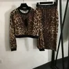 Luipaardprint sexy blouse overrok dames set mode lange mouwen T-shirt rits rok hoge taille splitrok