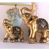 Objets décoratifs Figurines Statue d'éléphant en résine dorée Feng Shui Sculpture de tronc élégante Figurine de richesse porte-bonheur artisanat ornements pour la décoration intérieure 231009