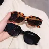 Lunettes de soleil Vintage Designer Cat Eye Femmes Hommes Mode Petit Cadre Mignon Ovale Rivet Lunettes de Soleil UV400 Nuances