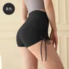 Shorts actifs 2023 été Sexy nu pantalons d'entraînement femmes taille haute ascenseur hanche serré court Tripe Yoga