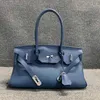 Handväska Shockless Designer Leather Women's Bag in Mall High Quality Top Layer Togo Cowhide Women's Hold Armpit Lock Bag