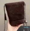 Dames luxe merktas Suède telefoontas Kleine zilveren bal Vintage ketting Verstelbare schouderriem Crossbodytas Prachtig en klein