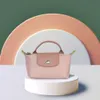 حقائب المصنع بالجملة Longchammp 2023 Autumn New Womens Bag French Longxiang Mini Dumpling Bag Mini Phone Crossbody Bag Bag Makeup Bag