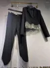 Kadın pantolon retro bahar ve sonbahar moda üst düzey beyaz elmas rhinestone saçaklı buzağı pantolon düzensiz siyah