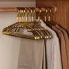 Hangers Rekken 10st Mat Goud Hanger Kleding Paard Aluminium Droogrek Antislip Kleding Handdoekhangers Garderobe Ruimtebesparende Organisator 231007