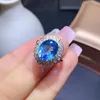 Bagues de cluster KJJEAXCMY Fine Bijoux 925 Sterling Silver Incrusté Naturel Bleu Topaz Femme Noble Atmosphère Deux Couleur Ovale Gem Bague Support