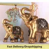Objets décoratifs Figurines Statue d'éléphant en résine dorée Feng Shui Sculpture de tronc élégante Figurine de richesse porte-bonheur artisanat ornements pour la décoration intérieure 231009