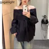 Kvinnors blusar Gaganight Kvinnor Black Off Shoulder Slash Neck Skjorta våren Hösten 2023 Franska High End Wide Truffle Top Kvinna