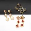 2022 Vintage Solid Color Lucky Four Leaf Clover Dingle örhängen för kvinnor Copper Charm Ear Studs Smycken Luxury Gift231x