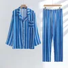 Kvinnors sömnkläder rand tryckt flerfärgade bomullsbyxor Pyjamas kostym för par mäns och lösa långärmade pijama kläder