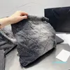 デザイナーデニムバッグトート旅行デザイナー女性スリングボディバッグハンドバッグ付きシルバーチェーンバッグ