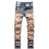 Джинсы Amirs для мужчин Мужские джинсы Рваные джинсы с оранжевыми звездами Классический крой с вышивкой букв на молнии Роскошные брюки-карандаш Дизайнерские джинсы Шикарные мужские узкие рваные джинсы