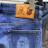 Jeans da uomo MasterMind 2023 Pantaloni slim casual alla moda scheletro Mmj Comfort di alta qualità stampato