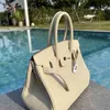 Bolsa de designer de couro genuíno bolsa bolsa platina milkshake de ouro branco prata prata litchi grão moda única ombro diagonal 2024 feito à mão