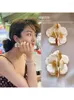 スタッドイヤリング韓国ユニークなエレガントな白い女性のためのファッション絶妙なメタルジュエリーパーティーギフト