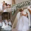 Vestidos de menina vestido de flor de tule branco puro para casamento com laço grande nas costas feito sob encomenda primeira comunhão marfim