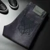 Tryckta höstens jeans Herrgrå svarta tredimensionella stämpeltvättkatt
