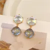 Dangle Oorbellen Koreaanse Mode Uitgeholde Bloem Ingelegd Gekleurde Kristallen Glazen Druppel Voor Vrouwen Elegante En Modieuze Sieraden