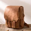 Sac à dos d'école en cuir véritable pour hommes, sac de voyage unisexe à la mode