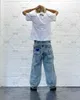 Jeans da uomo 2023 American High Street alla moda vita retrò Harajuku ricamo teschio pantaloni larghi a gamba dritta oversize per uomo