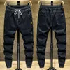 Jeans da uomo Primavera Harajuku Design Moda Coulisse Casual Denim Cintura Gamba affusolata Streetwear Pantaloni da lavoro Uomo