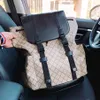 Mochila de diseñador Monedero de marca de lujo Correas de hombro dobles Mochilas Cartera de mujer Bolsos de cuero real Bolsos de dama a cuadros Equipaje de lona por bradn 001