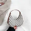 Våren 2023 Fashionabla Wternized Shoulder Leisure New Moon Simple Crossbody Bag Women -butiker är 95% rabatt på clearance grossist