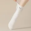 Femmes chaussettes haute élasticité Couple aspiration magnétique drôle grands yeux Unique mi-tube mignon pour les Couples hommes