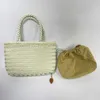 Dragon D is the same French style small woven bun with a layer of cowhide and pure handmade vegetable basket bag 231010