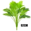 Christmas Decorations 65-92cm Large Artificial Palm Tree Tropical Plants Branches Plastic Fake Tree Iron Leaves Christmas Home Garden Room Decoration 231010