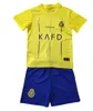 2023 24 Al Nassr Kids Kit Soccer Jerseys Fofana Otavio Madu Al-Ghannam Al-Amri al-Sulaiheem Telles Al-Hassan Home Away Football Shirts 66662