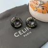 Earrings CLNE Designer Luxury Fashion Women French Arc De Triomphe Cool Black Resin Button Earrings Light Luxury Versatile Palace Style Earrings