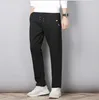 Pantaloni da uomo Pantaloni autunnali Uomo Fitness Abbigliamento sportivo Tuta Elastico in vita Pantaloni sportivi Pantaloni di cotone Palestre larghe Jogger Pantaloni da pista Uomo M- 8XL 231010