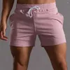 Męskie szorty 4xl mężczyzn bawełniany przyczynowy trening fitness trening gym sportowy kieszonkowy bokserki pnia stroje oddychające spodnie