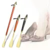 Altra organizzazione delle pulizie Testa di cavallo Sollevatore per corno per scarpe Calzascarpe universale con manico lungo in faggio 231009