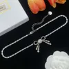 Muimu-Halskette, Designer-Schmuck, Originalqualität, leichte Luxus-Halskette, Schleifenknoten, vielseitig, einfach, fortschrittlich, elegant und süß, Halskette für Frauen