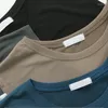 女性用Tシャツ綿女性のノースリーブベストカジュアルルーズファッション夏OネックTシャツソリッドカラーシンプルエレガンススポーツ用途の女性