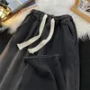 Japońskie dżinsy męskie japońskie sznurka prosta rurka luźna ponadwymiarowa modna swoboda amerykańska High Street Wszechstronne szerokie spodnie
