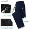 Męskie spodnie jesienne spodnie męskie fitness Sportswear dres elastyczne talia dresowe bawełniane spodnie luźne siłowni jogger track