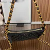 El çantası kadın tasarımcı çanta lüks cüzdan deri omuz çantaları moda dokuma zinciri benzersiz işlem debriyajı çapraz çanta basit elmas kafes siyah çanta