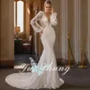 Boho Sheer Deep V-Neck Abito da sposa Maniche lunghe a lanterna Applicazioni in pizzo Beach Sirena Abito da sposa Backless Robe De Mariee 328