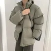 Korki damskie płaszcze kurtki zimowe 2023 Koreańska wersja gęstej i ciepłej luźnej płaszcza krótka kurtka wyściełana oversize