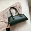 Senior gevoel van licht luxe retro schoudertas vrouwelijke 2023 nieuwe Hong Kong wind okseltas kleine mode ins baguette tas