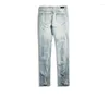 Mäns jeans bär 2023 smal knäskador kniv klippa små ben byxor stora hål stretch män