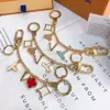 Luxury Designer KeyChain Fashion Classic Brand Key Buckle Flower Letter Key Chain Handgjorda nyckelringar Menskvinnor Väskor Pendant306K