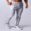 MarchWind Marque Designer Pantalons de jogging Hommes Sport Pantalons de survêtement Courir Hommes Joggers Coton Trackpants Slim Fit Pantalon Bodybuilding Trou251K