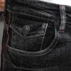 Mäns jeans europeiska vintage mode män retro svart grå elastisk smal fit rippad skrapdesigner casual denim blyertsbyxor